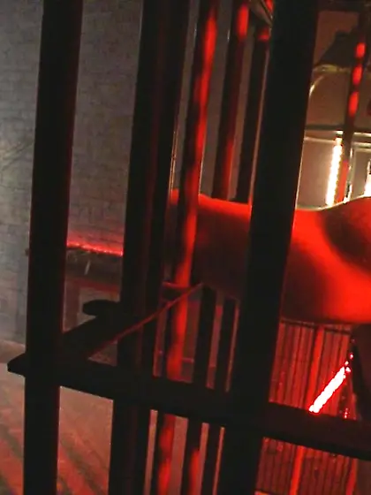 Enchained blindfolded guy caned