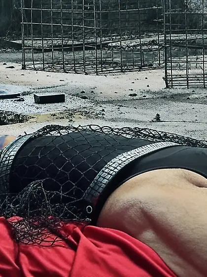 Black Superhero captured in netting.  KO and fondle