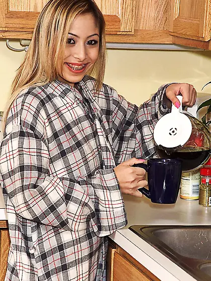 Flat chested filly Kat unwraps her petite smooth body in the kit