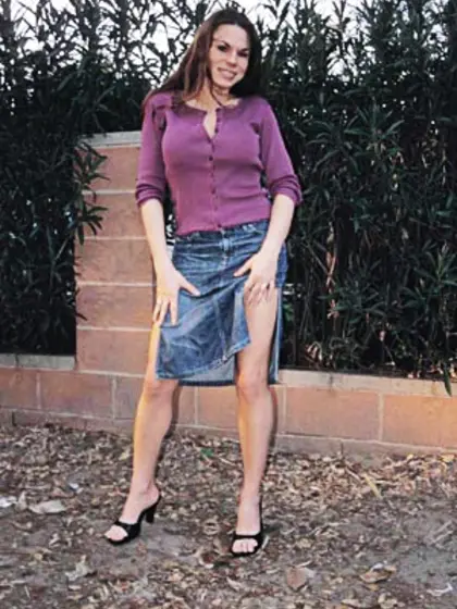 Redhead tranny takes off her super sexy lingerie