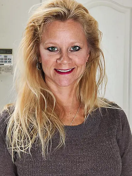 Busty blonde milf Ali Jones removes all her clothes and shows of