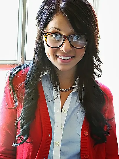 Bored bookworm with lovely glasses not shy to show medium tits a