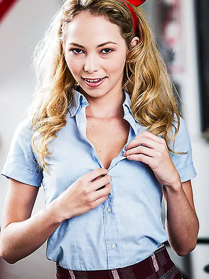 Striptease and passionate smile of girl who is completely naked