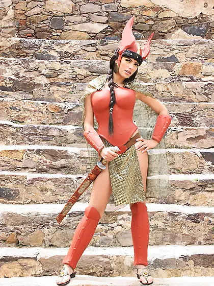 Kinky brunette model True Tere dresses up as a viking and teases