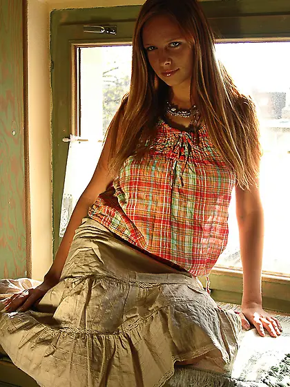 Busty blonde babe Carmen Gemini strips her mini skirt and shows