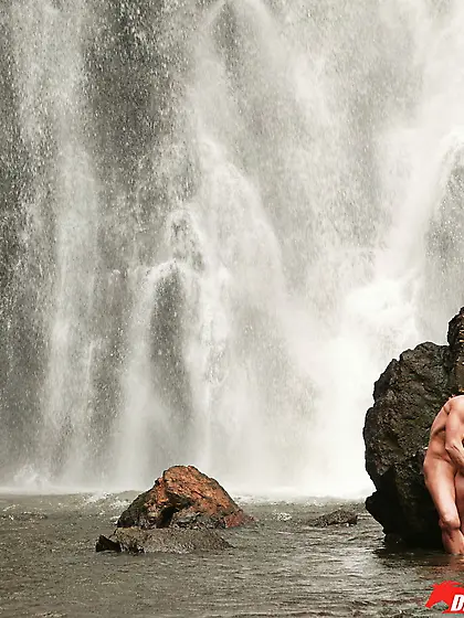 Wild blond-haired nympho gets banged near a beautiful waterfall