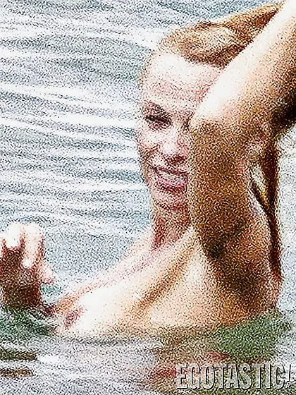 Pamela Anderson Goes Topless on a Beach in France