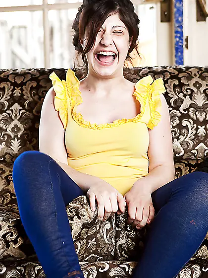 Giggling babe with natural breasts is here to show her cleavage