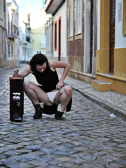 Playful sweetheart strips down to demonstrate big nipples and ha