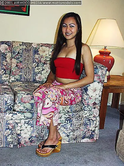 Sabrine Maui seductively removes her clothes before spreading he