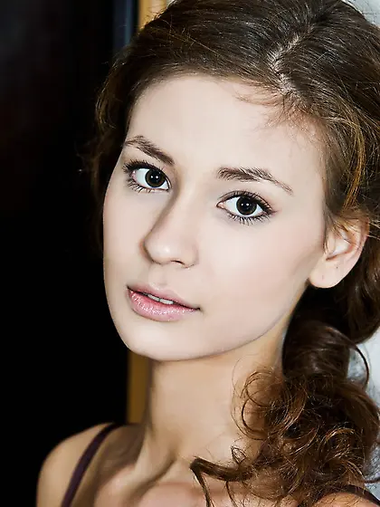 Irina J takes her sexy brown lingerie on the sofa and shows us h