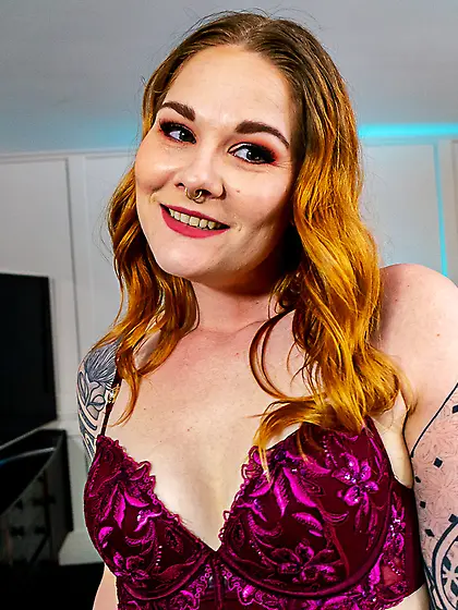 Lavishly tattooed redhead MILF with natural tits gets pounded in