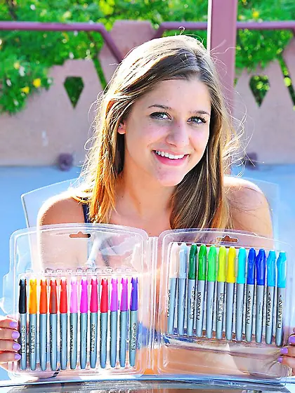 Blonde sweetie Teddi Rae teases with her teen bod and stuffs pen