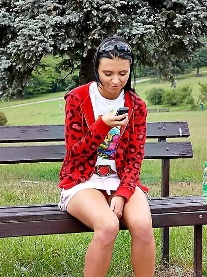 Tinna Nubiles takes her cute mini skirt outdoors and shows her f