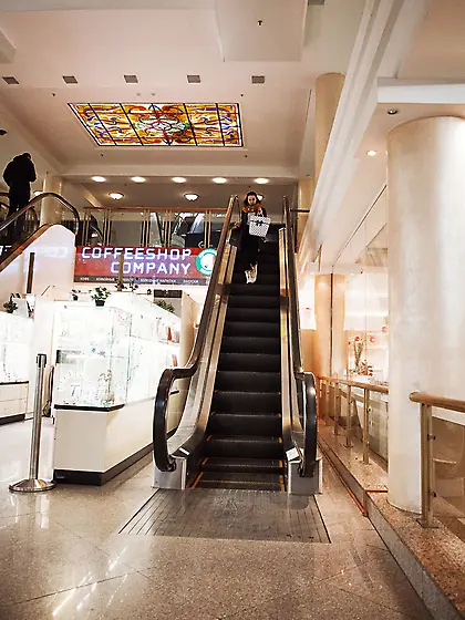 Wavy-haired brunette teen shows her hairy pussy on a big couch V