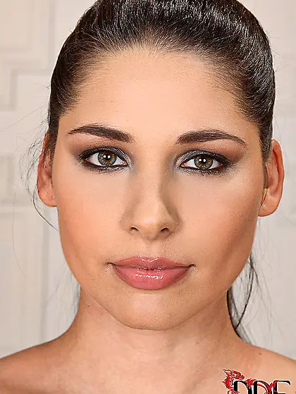 Busty naked lassie Zafira enjoys having her arms bound behind wi