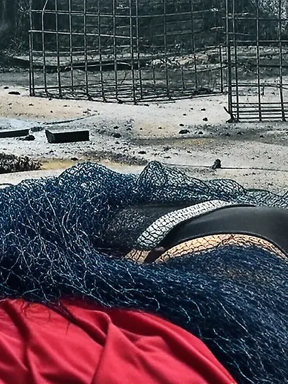 Black Superhero captured in netting.  KO and fondle