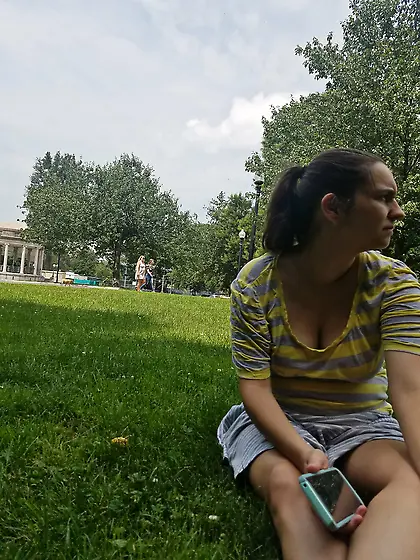 Upskirt of a braless hot milf