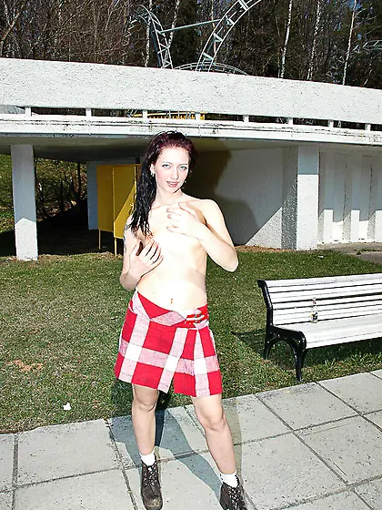 Teen brunette pissing in the park