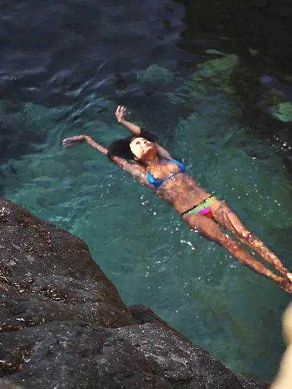 Tanned and short-haired beach bum takes off her white outfit Vid