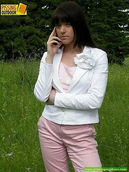 Pretty brunette peeing