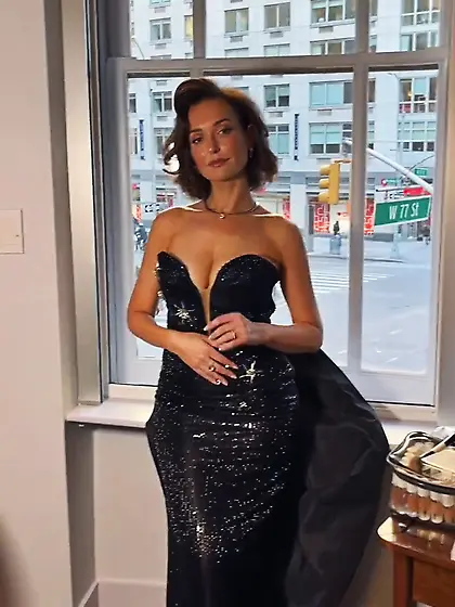 Milana Vayntrub - in a black dress - 3/19/26