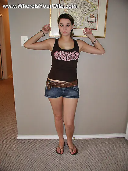 Busty young wife undresses