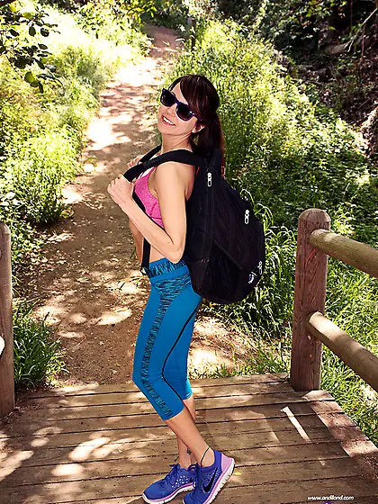 Tattooed brunette belly ring