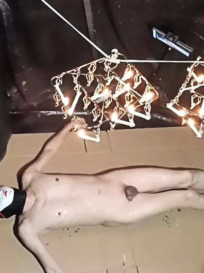 Wax is dripping from the laundry hanger.