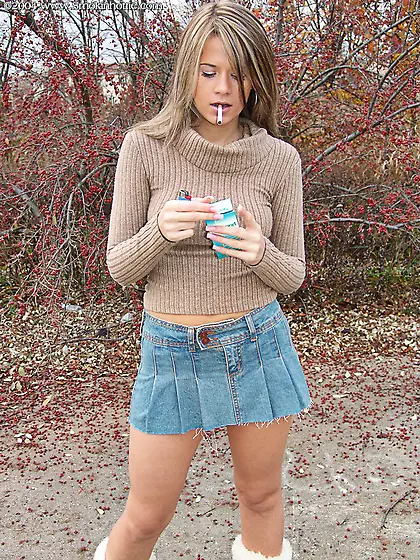 Ann Angel takes her sexy blue skirt off and teases us with her a