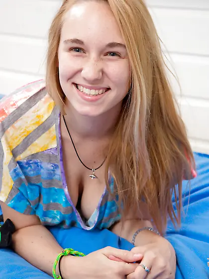 Natural boobs babe keeps her legs raised as she shows her body