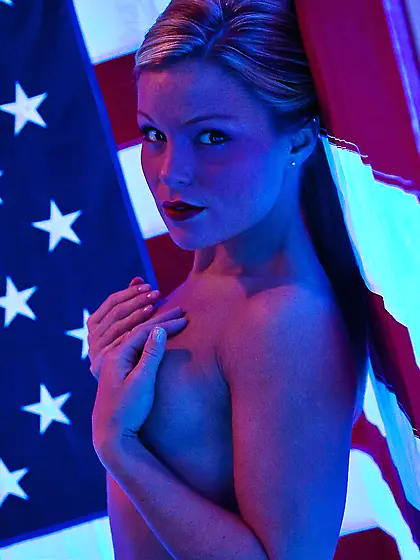 Perverted chick Meet Madden is posing half naked against the Ame