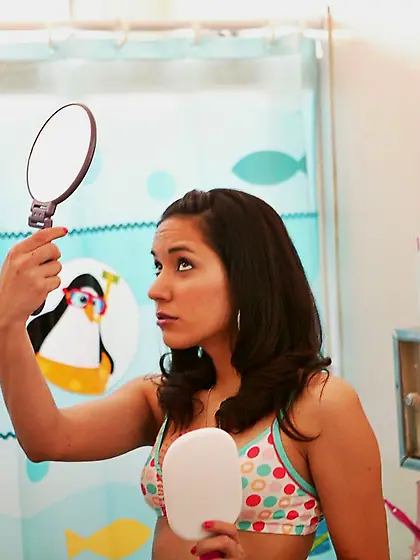 Teenage latina Tia Cyrus removes her panties and gets handcuffed