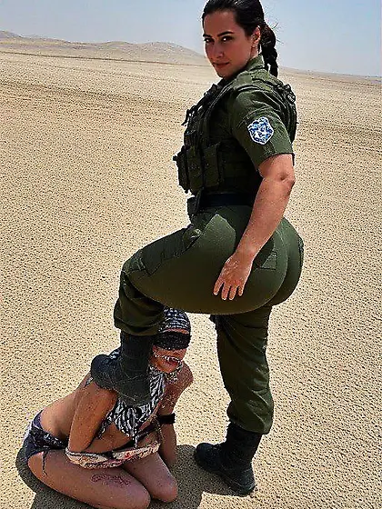 Israeli IDF Girl Steps On Sand Nigger Muslim Slave
