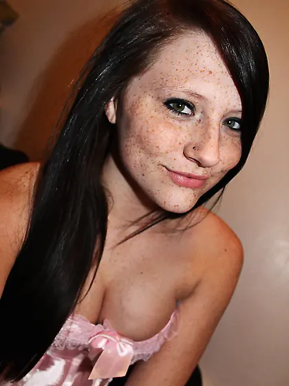 Gorgeous brunette in corset and panty Freckles is doing hot show