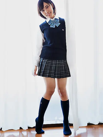 Cute Japanese schoolgirl likes to show off her perky tits