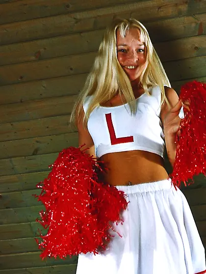 Tanned cheerleader loves her white toy