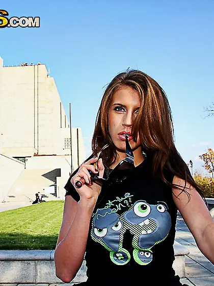 Aida gives public teasing a go as she shows off while outside