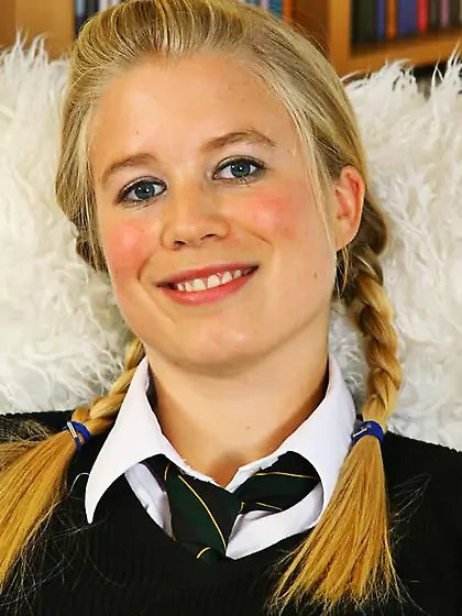 Gabriella T in her college uniform and stockings