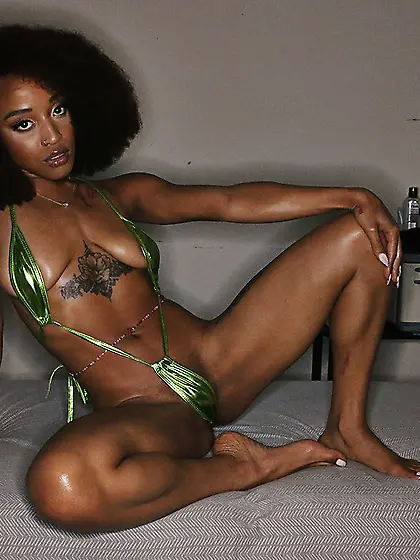 Ebony masseuse with an amazing body servicing a thick cock