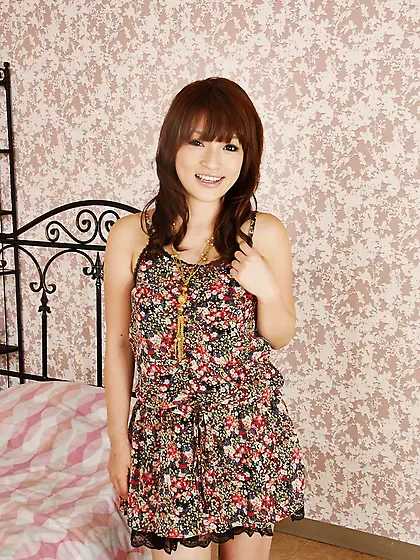 During photo shoot in bedroom Asian beauty provocatively takes c