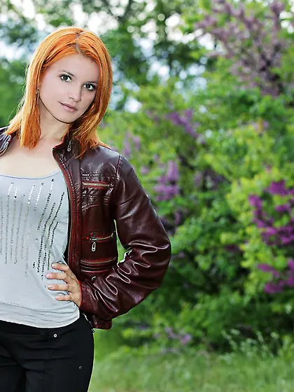 Beautiful nude softcore posing from the redhead foxy that spends