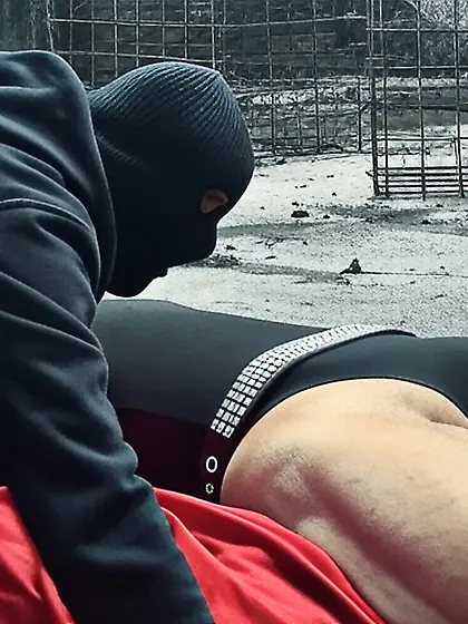 Black Superhero captured in netting. KO and fondle