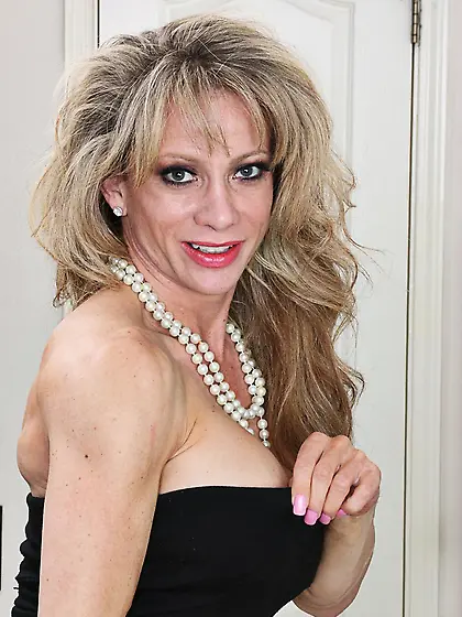 Sexually excited milf Raquel Sultra is slowly stripping and mast