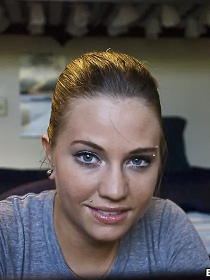 Brandi Belle takes her clothes off on the bed and gets her hungr