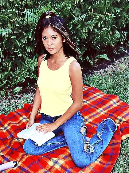 Asian babe Leilani has a picnic where she strips her tits and mi