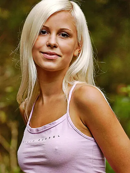 Lovely blonde not shy to strip naked right in the middle of spac