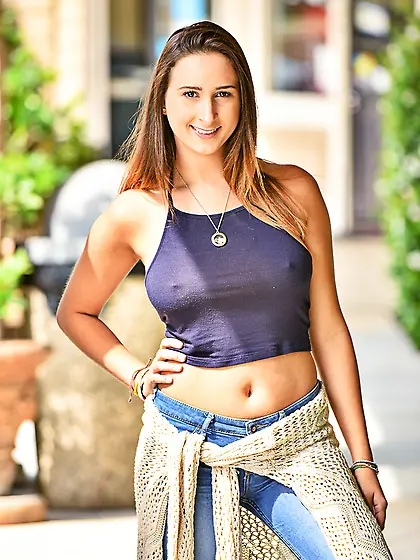 During walk via city streets Ashley Adams loves to show her natu