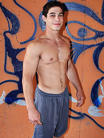 Curly-haired gay posing naked to attract...