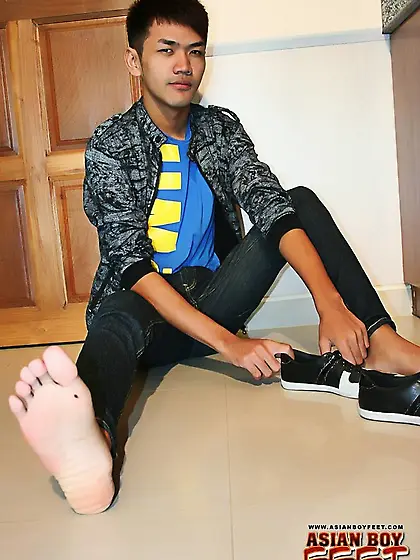 Handsome asian takes gray